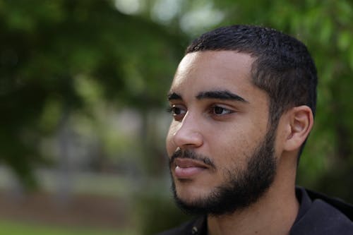 Young Bearded Man Looking Away
