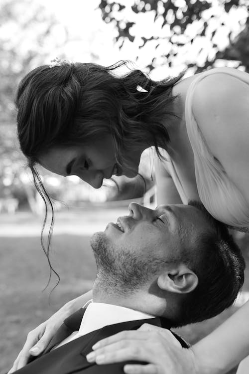 Smiling Newlyweds Posing in Black and White