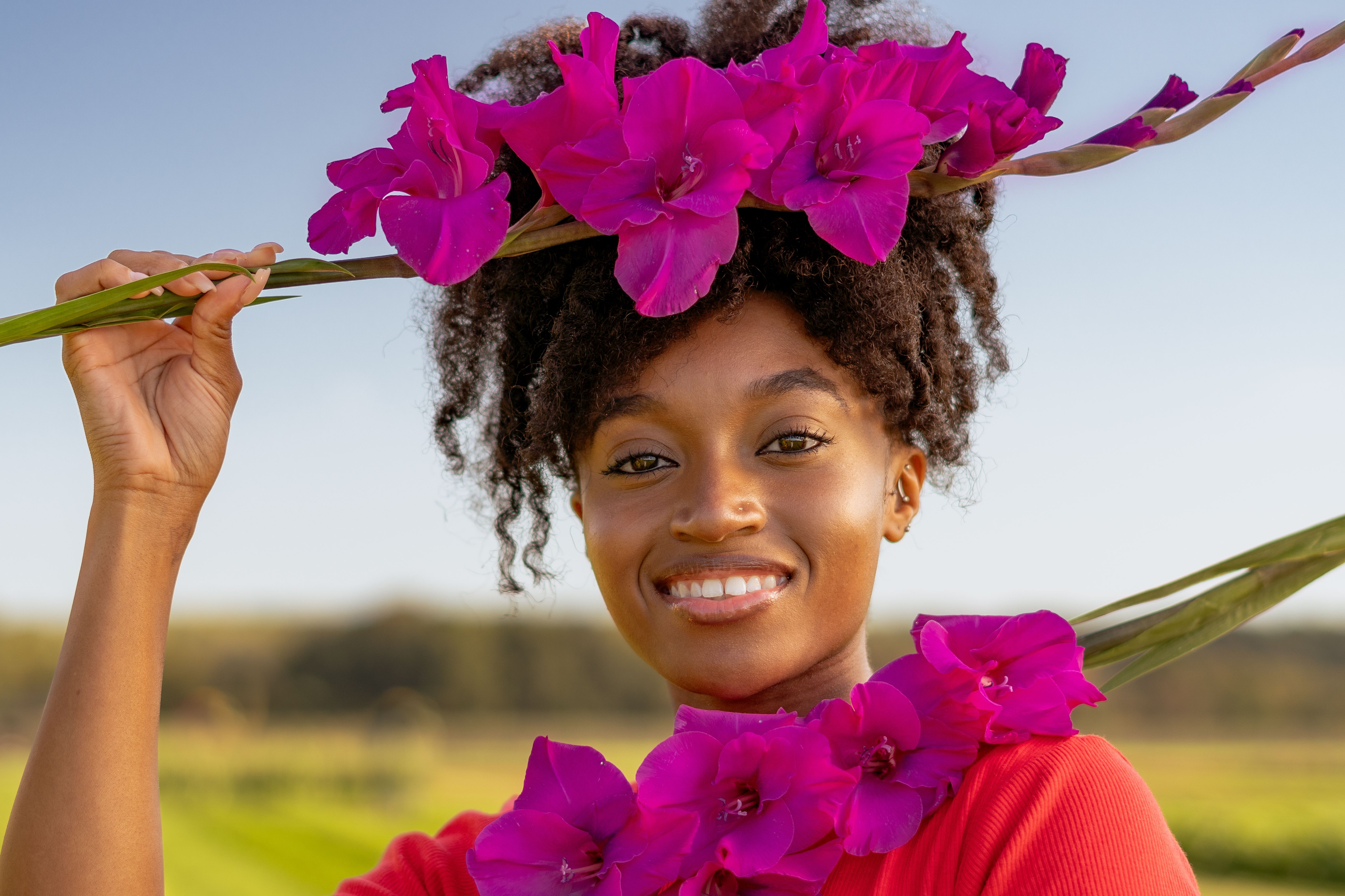 A woman with flowers in her hair · Free Stock Photo