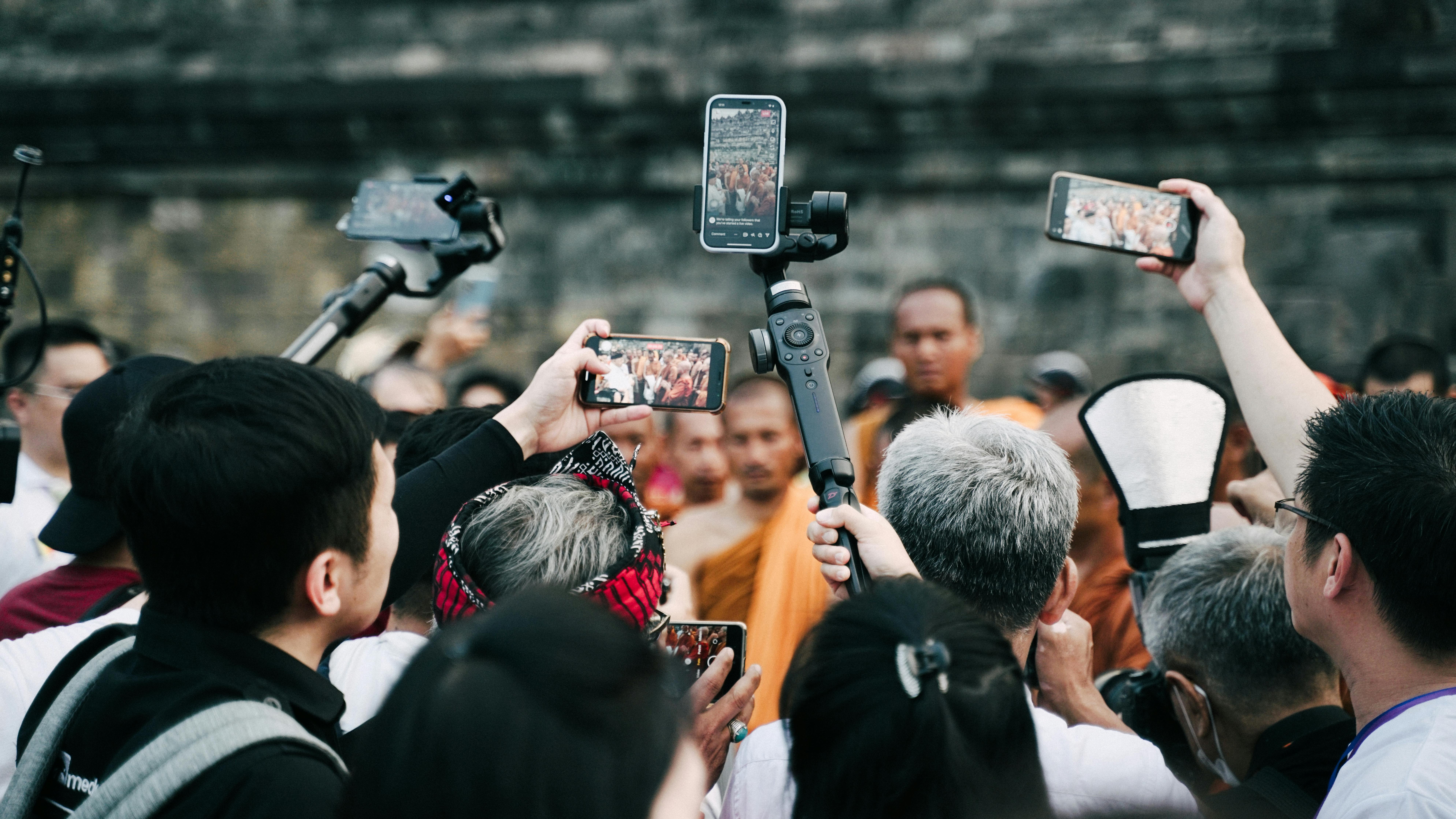 journalists and visitors of borobudur interviewed the bhante who walked from thailand to indonesia