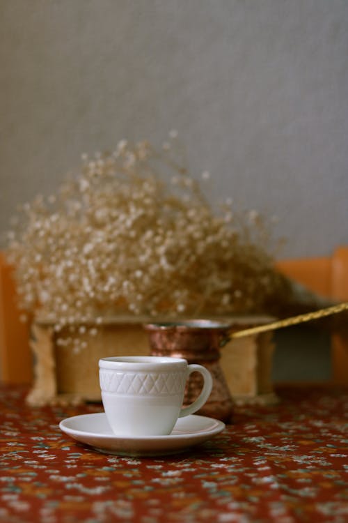 White Coffee Cup on Saucer