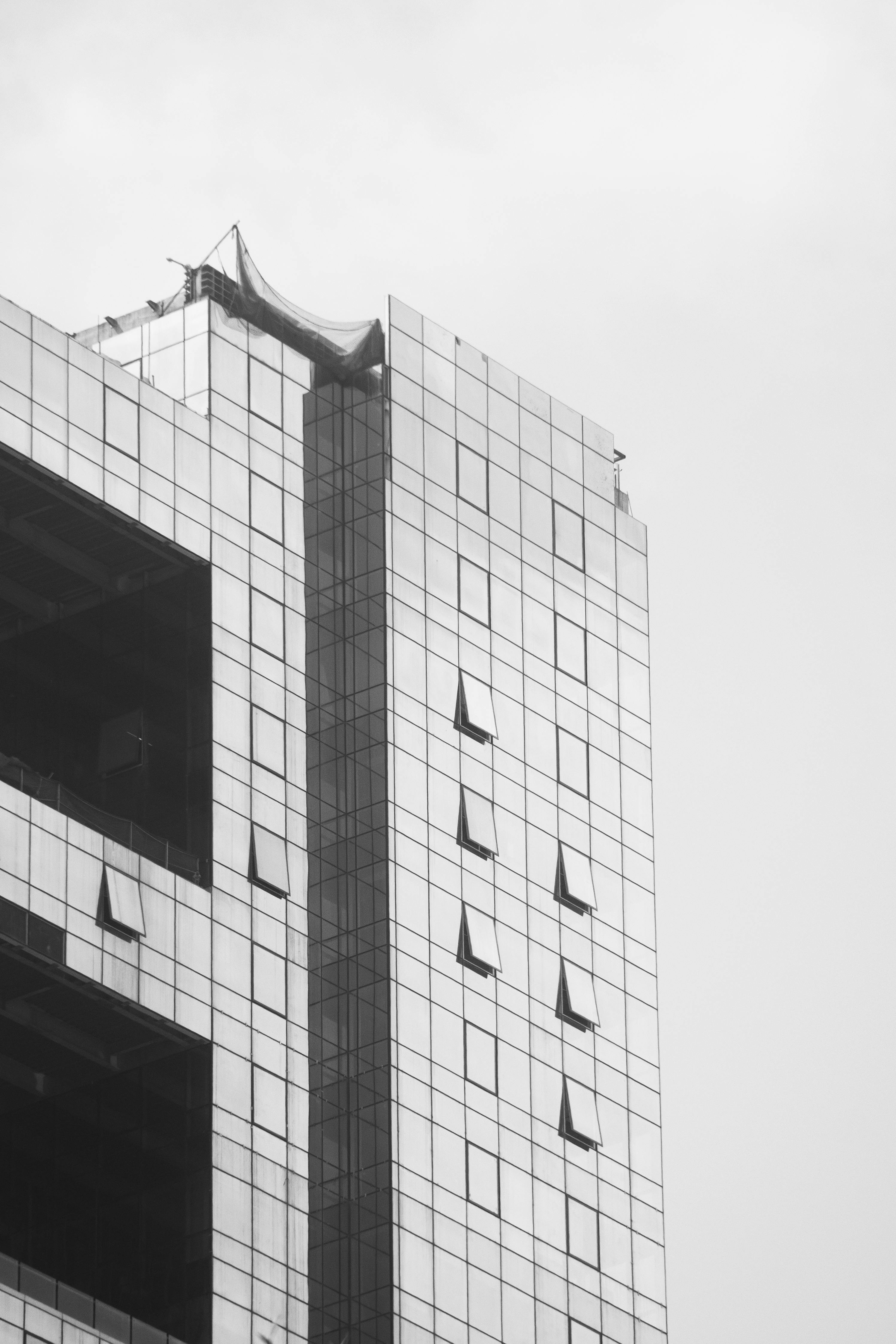 black and white photo of a building with a window