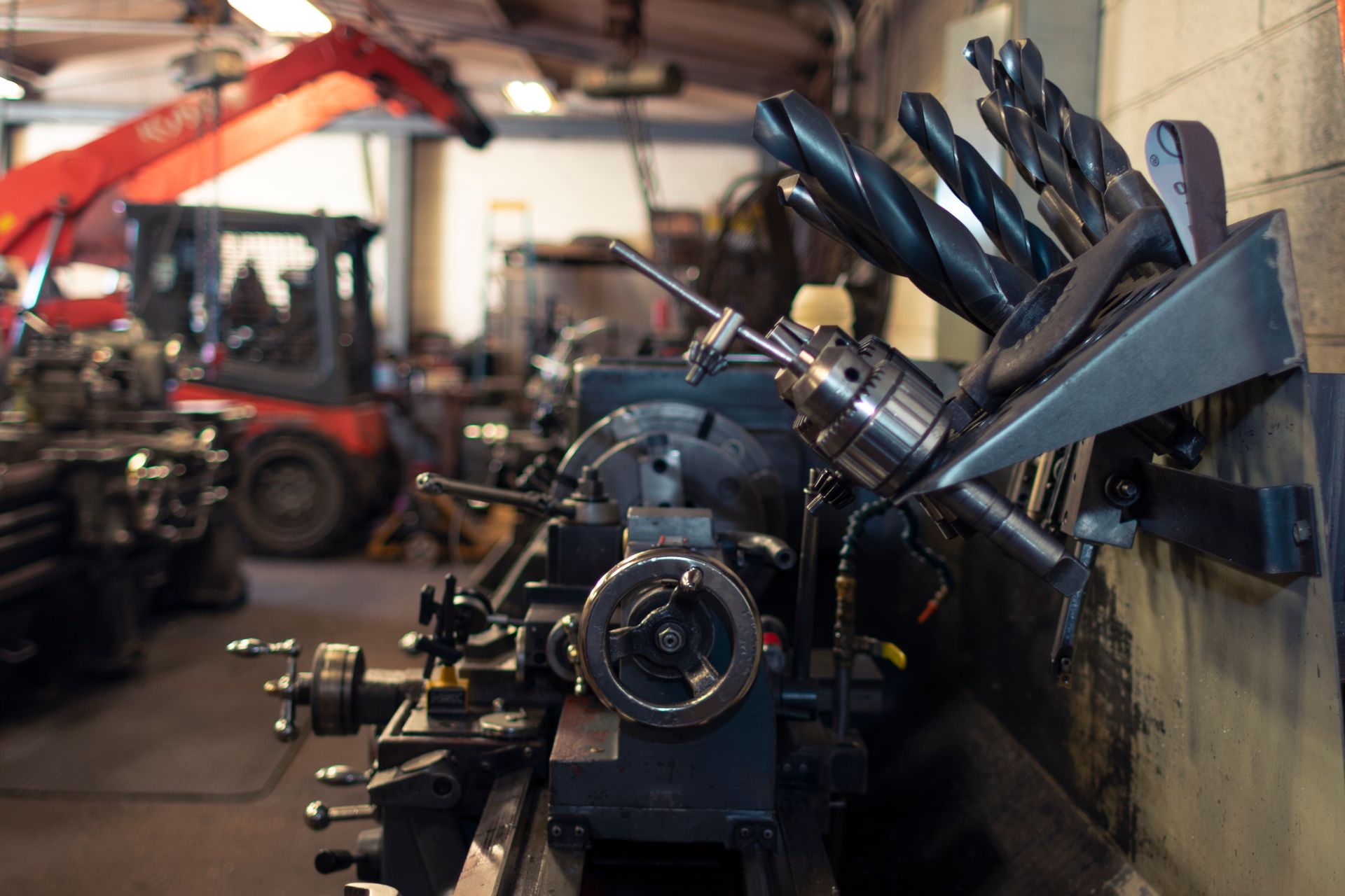 A machine shop with a large machine and tools