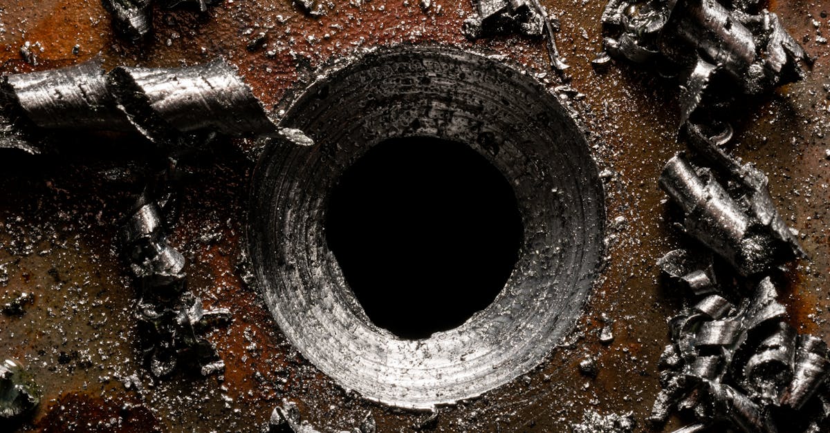 Detailed view of metallic shavings and rusty surface, showcasing industrial decay.