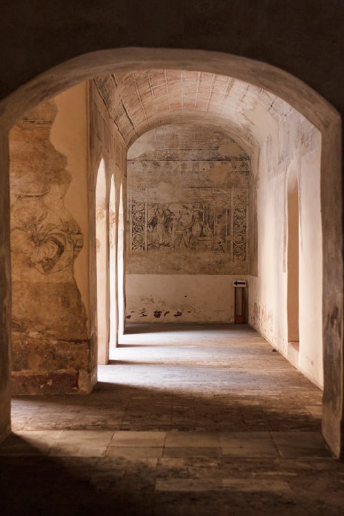 Free Beautiful arched hallway with ancient paintings in Acolman, Mexico. Stock Photo