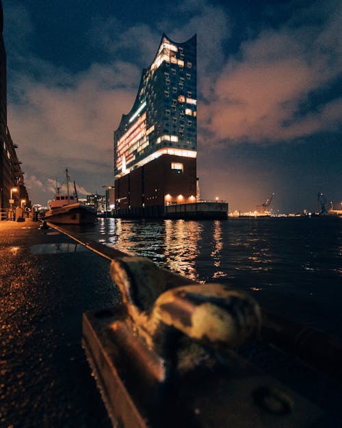 Elbphilharmonie Building and a Boat in the Harbor in Hamburg, Germany