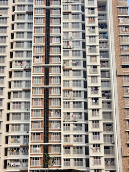 High-rise residential building facade in Mumbai, showcasing modern architecture.