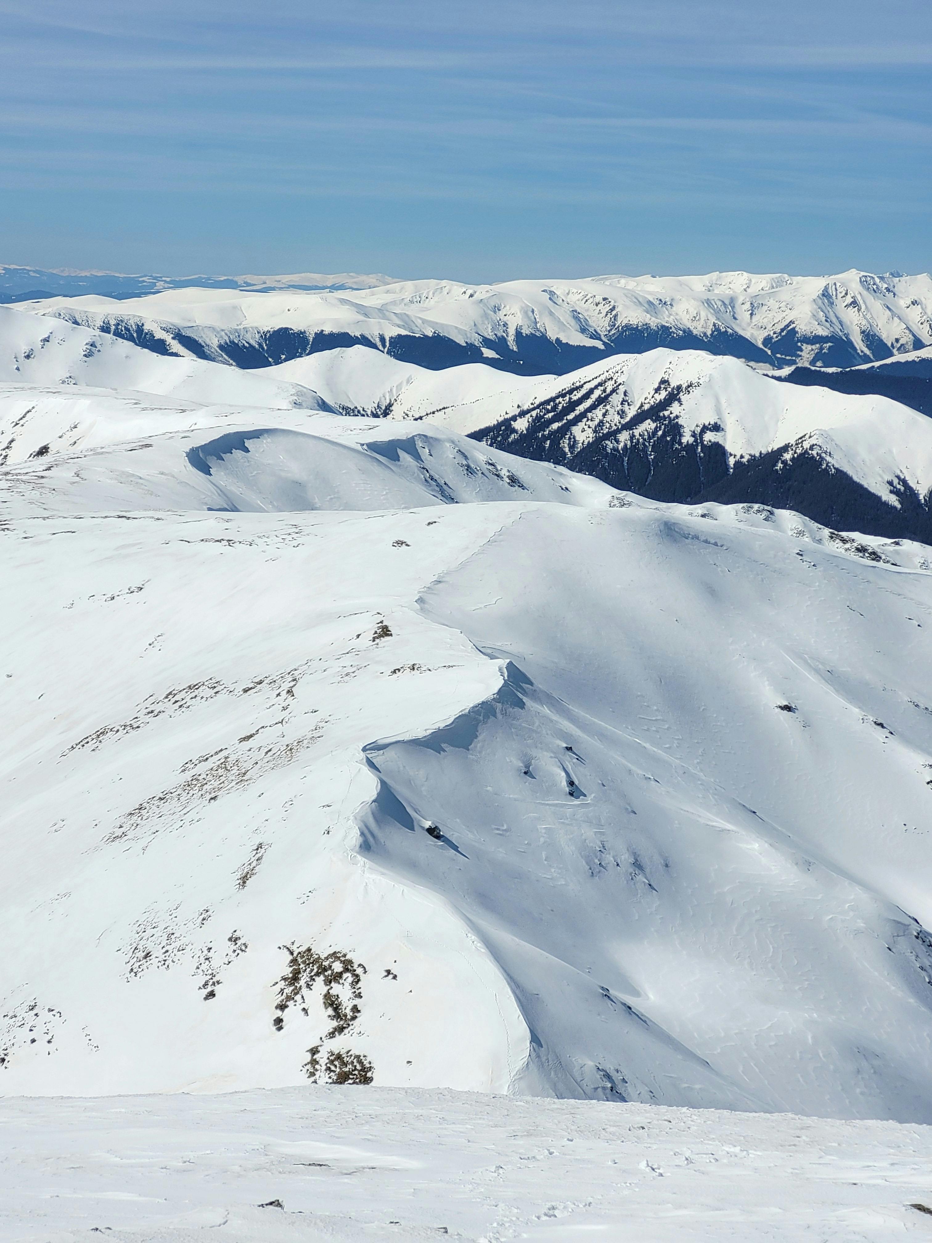 Prescription Goggle Inserts - Panoramic view of snow-covered mountains in Romania's winter wonderland