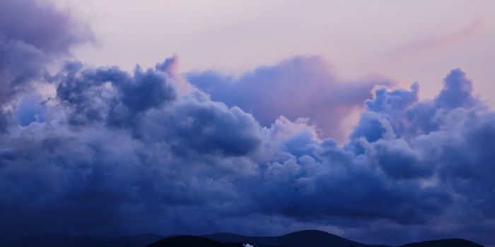 Explore a stunning and dramatic cloudscape over Penrith, England at sunset with vibrant colors filling the sky.