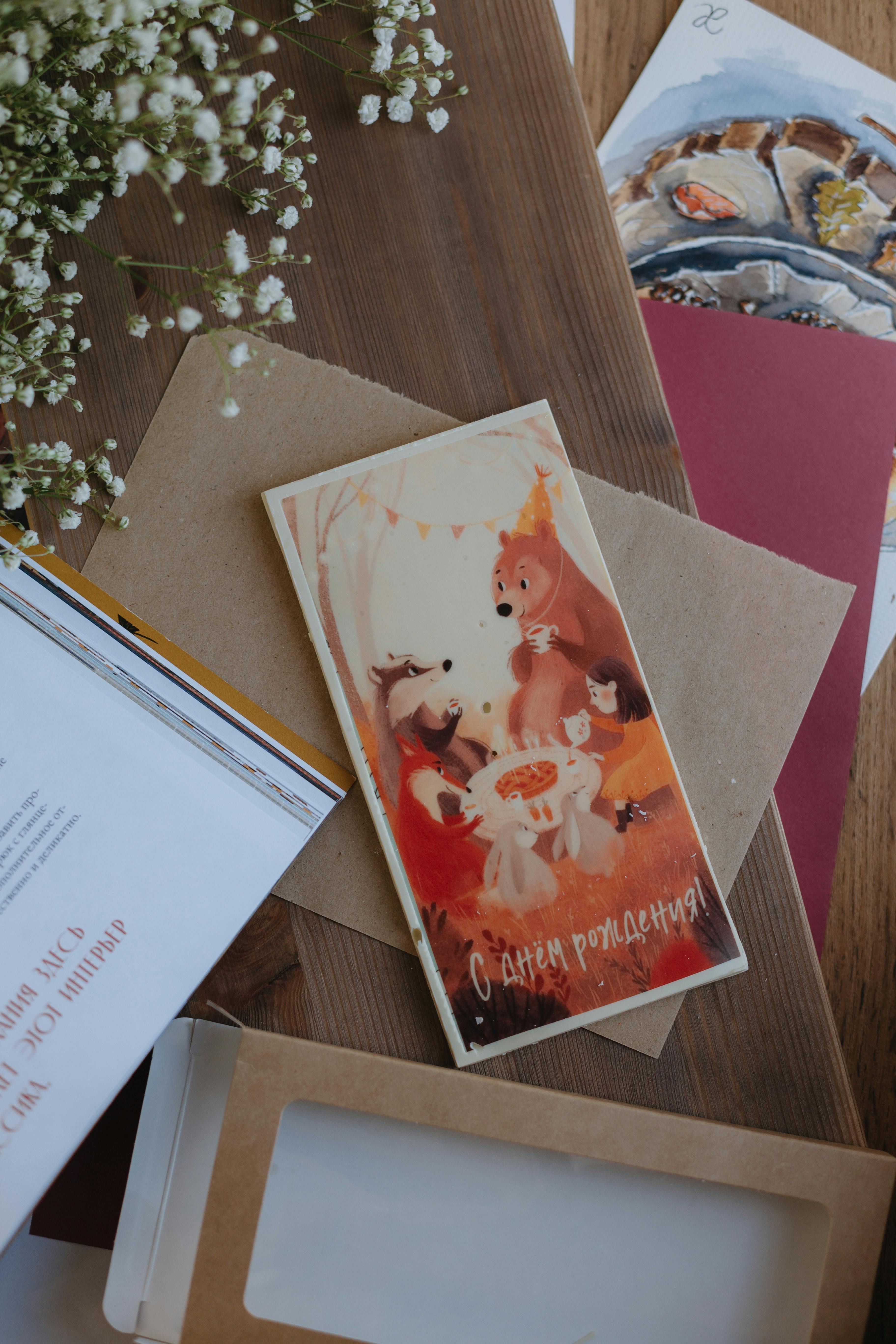 a card with a picture of a fox and flowers