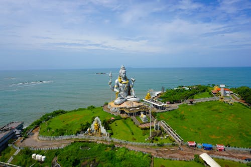 Foto profissional grátis de à beira-mar, cultura hindu, deus hindu