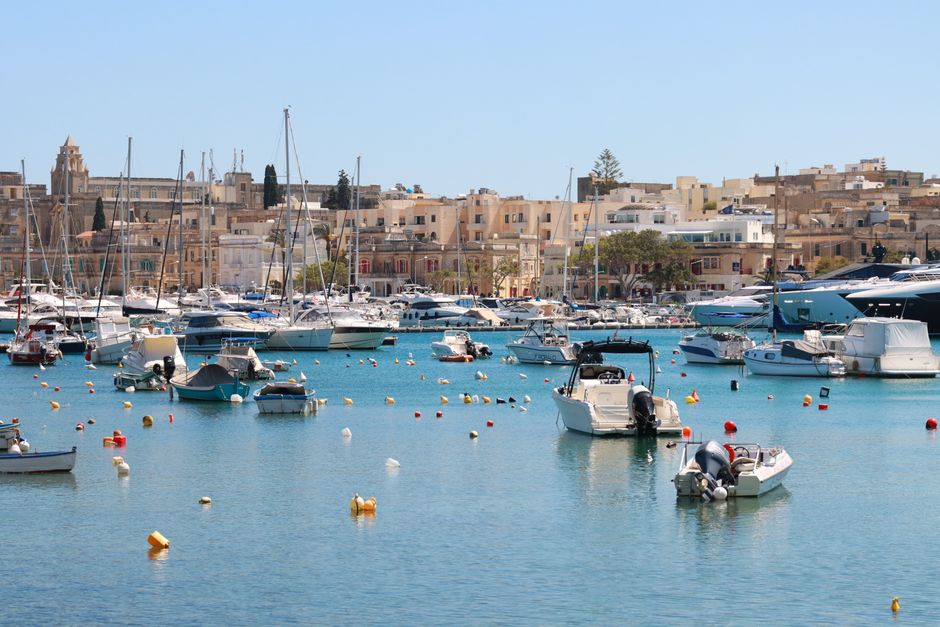 Incredible Private Boat Charter to Comino Blue Lagoon Review: An Unforgettable Malta Sailing Experience Review 2026 - A stunning view of Valletta's harbor with yachts and historic buildings under a clear sky.