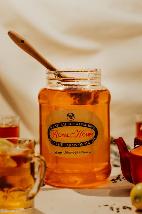 Honey in a Jar on a Table 