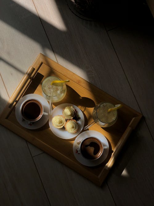 Cupcakes and Coffee on a Wooden Tray 