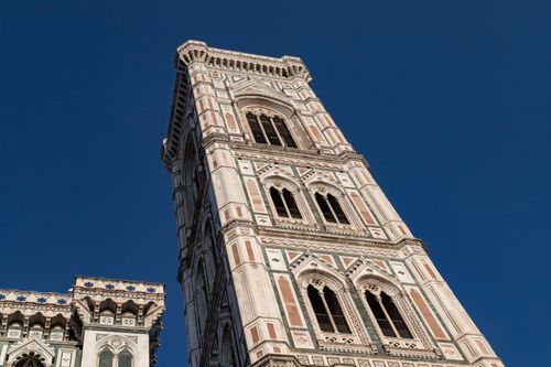 Free Stunning view of Giotto's Campanile in Florence against a clear blue sky, showcasing Gothic architecture. Stock Photo