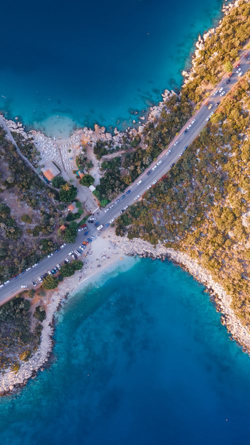 Free Stunning aerial view of the turquoise waters and rugged coast in Kaş, Antalya. Stock Photo