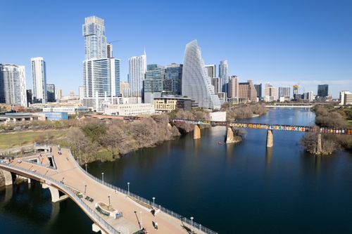 Free A stunning aerial view of Austin's skyline featuring modern skyscrapers, bridges, and the river. Stock Photo