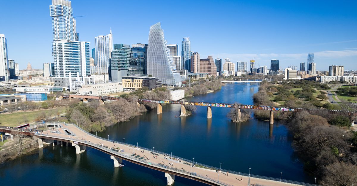 Stunning aerial view of the Austin skyline with bridges spanning the Colorado River.