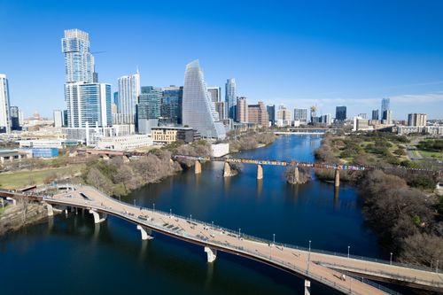 Free Stunning aerial view of the Austin skyline with bridges spanning the Colorado River. Stock Photo