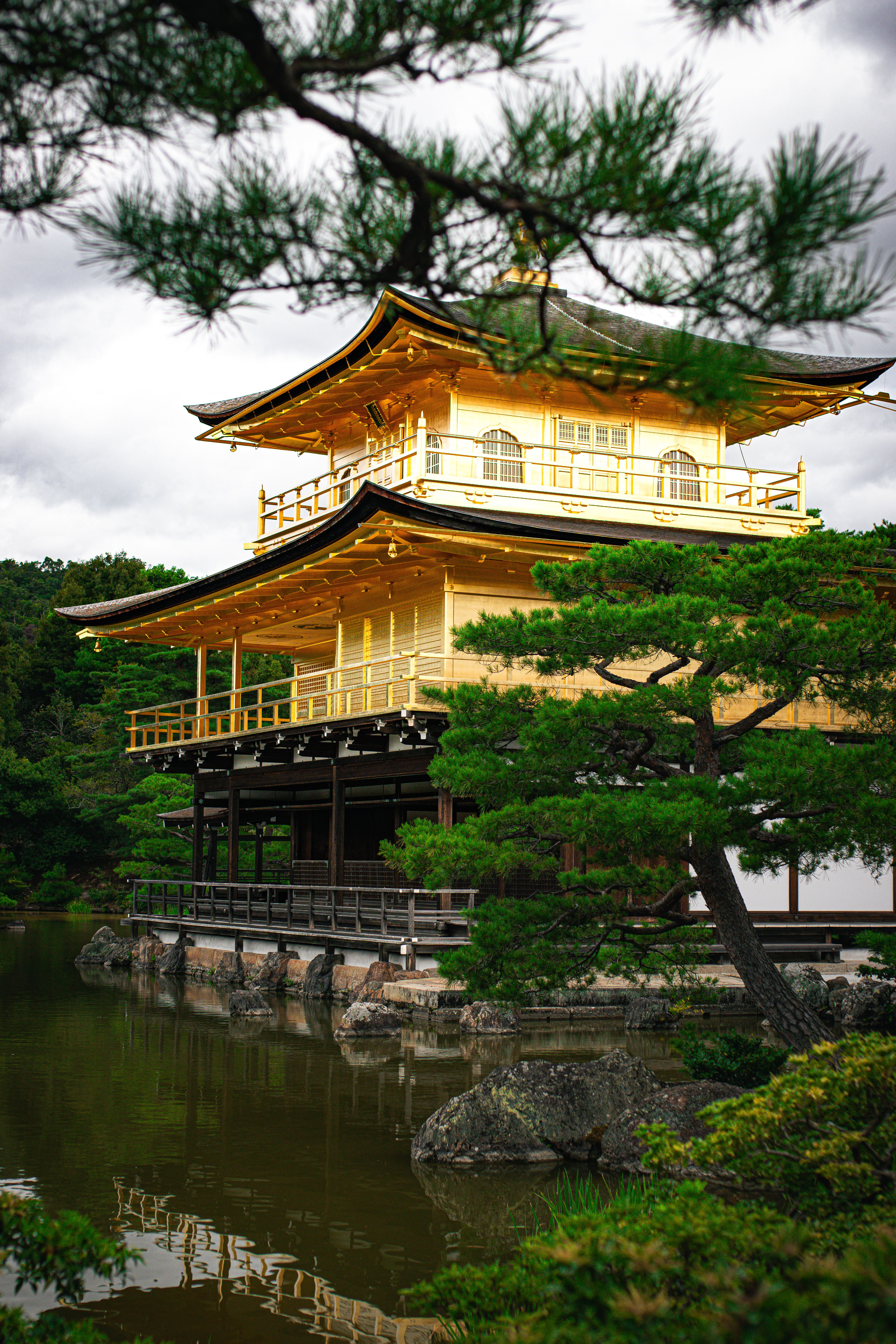Red and Black Temple Surrounded by Trees Photo · Free Stock Photo