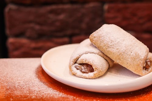 Rolled Cookies with Apple Jam and a Sprinkle of Powdered Sugar