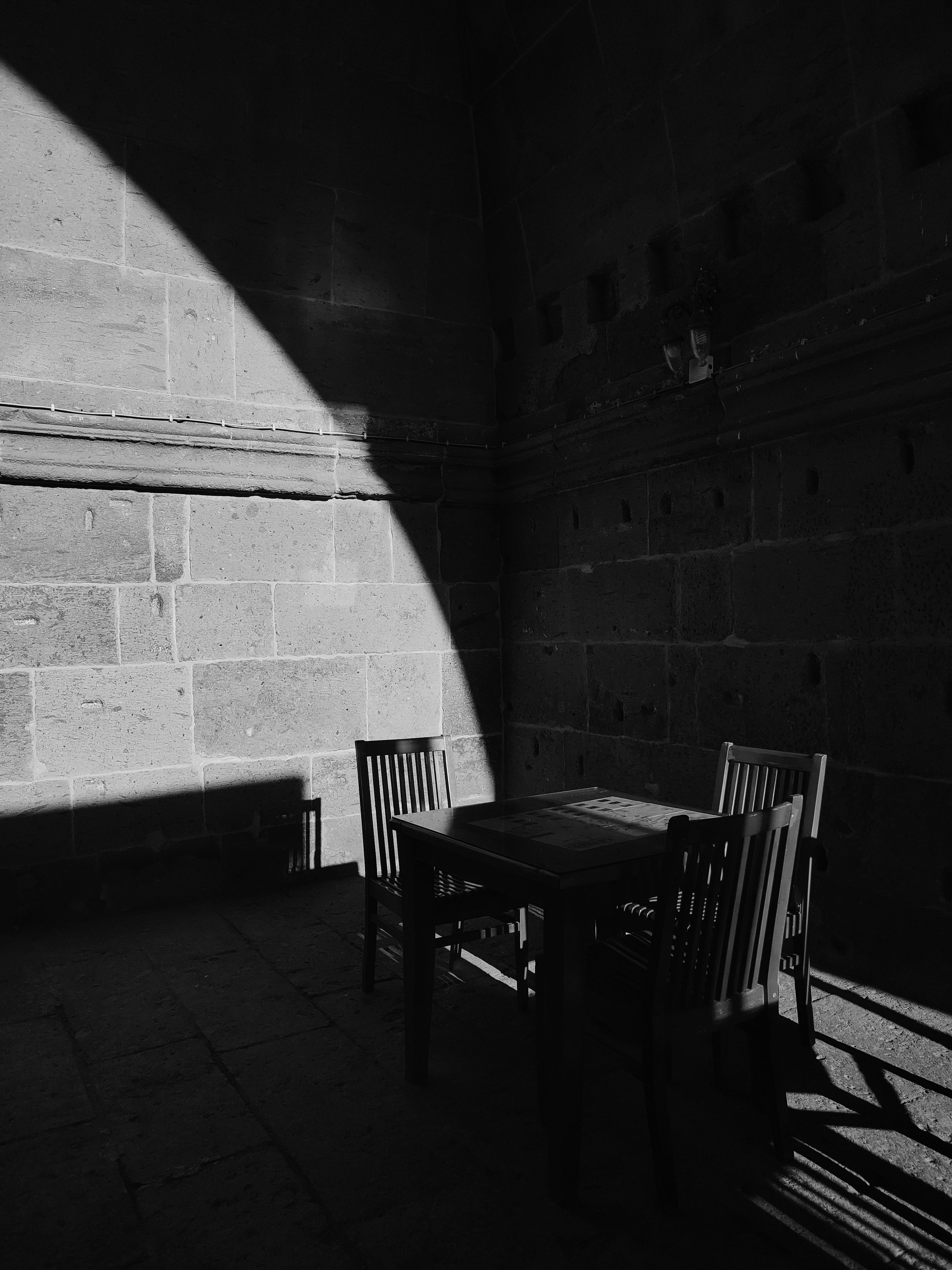 Table and Chairs in Shadow · Free Stock Photo