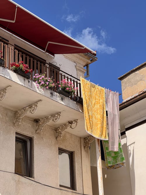 Fabrics Drying on Balcony