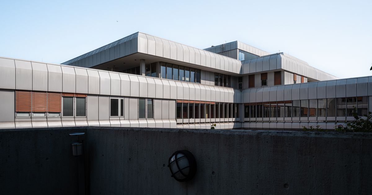 Modern hospital building facade with large windows