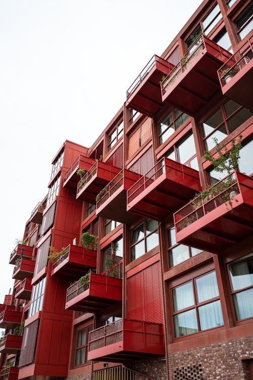 Balconies in Red Apartment Building 