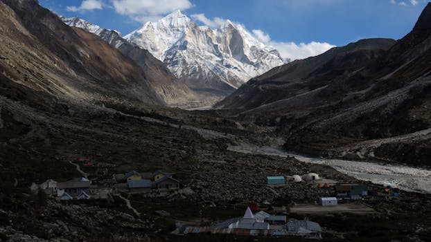 Breathtaking winter landscape of Gangotri mountains in Uttarakhand, India with snow-covered peaks.