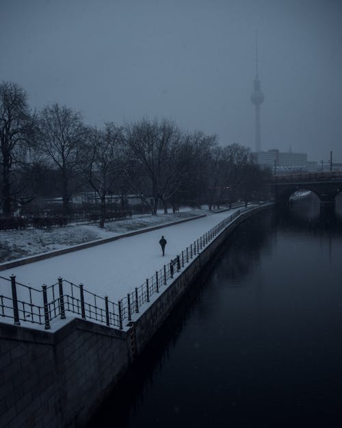 A Pavement along the River in City in Winter 