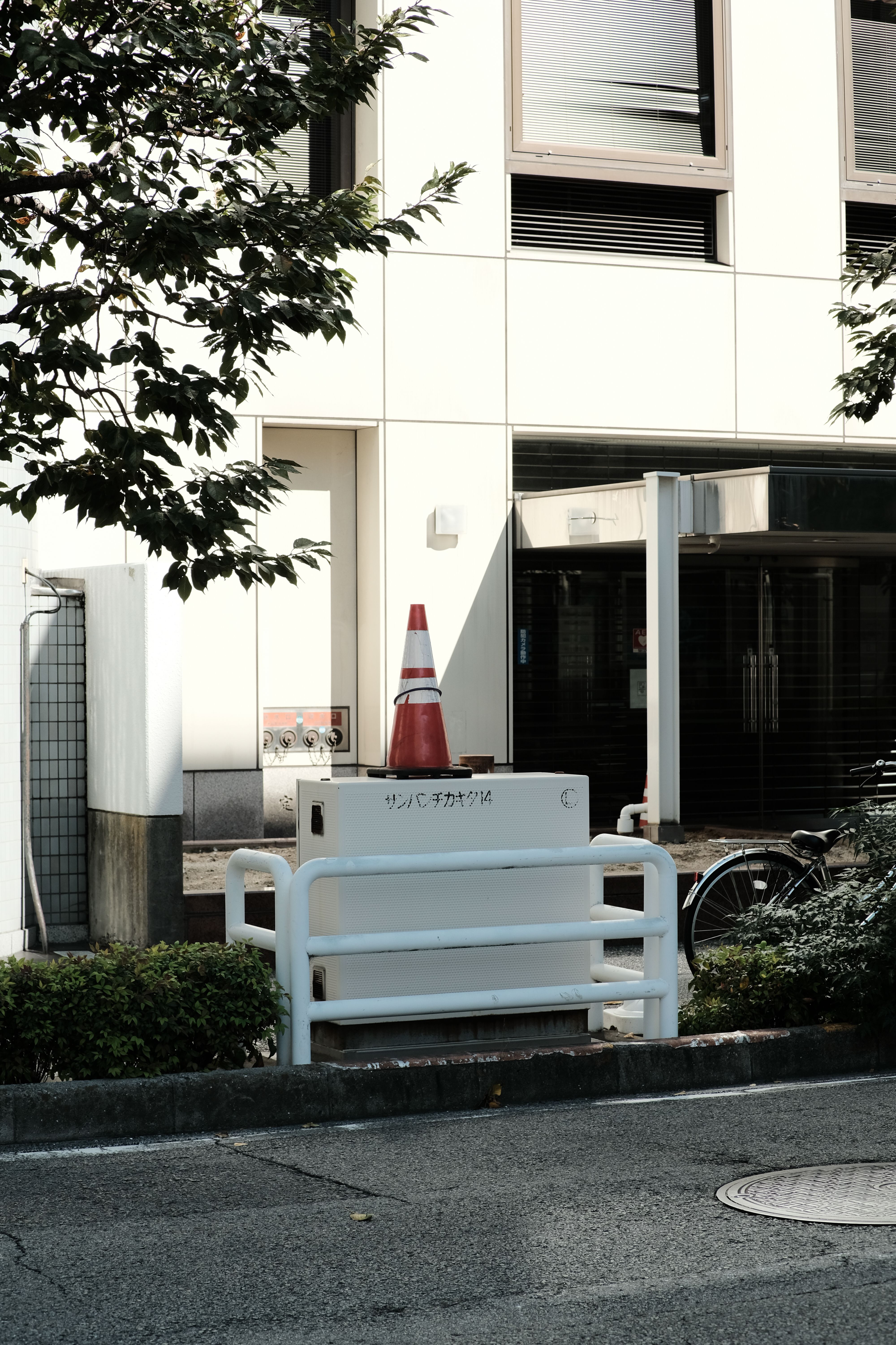 Cone on Box near White Building · Free Stock Photo