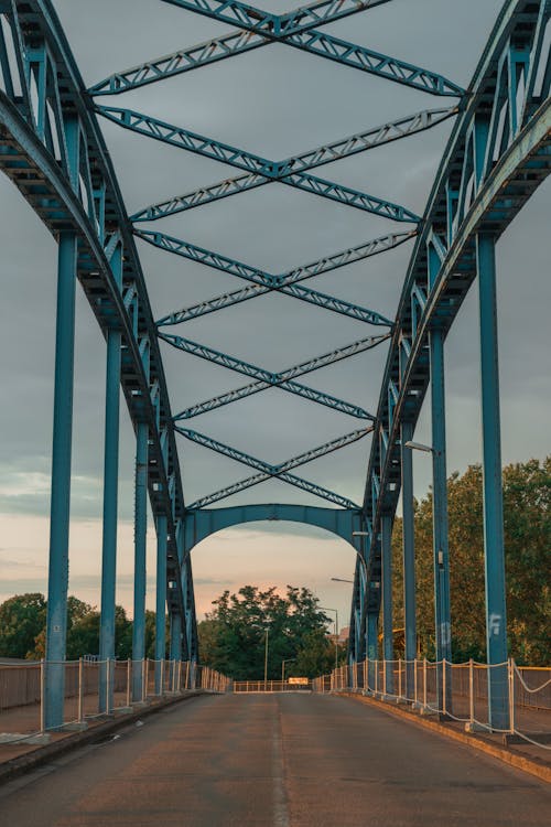 Symmetrical View of an Asphalt Road on a Bridge