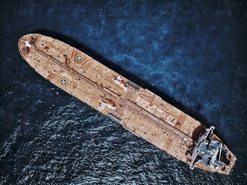 Aerial Photo of a Cargo Ship Sailing in Ocean