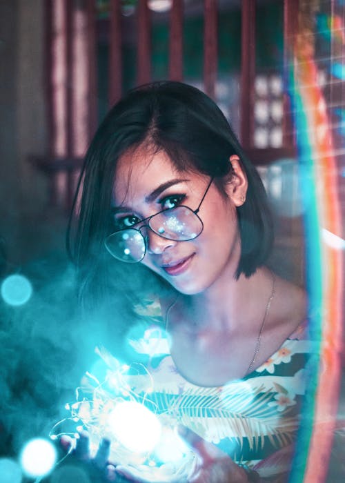 Woman Holding Strip Lights