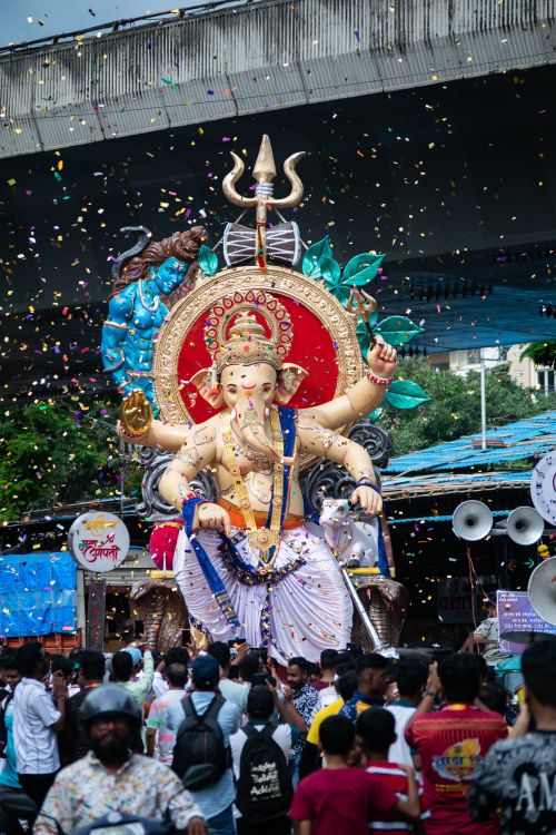 Free Colorful celebration of Ganesh Chaturthi with a grand procession in Mumbai, India. Stock Photo