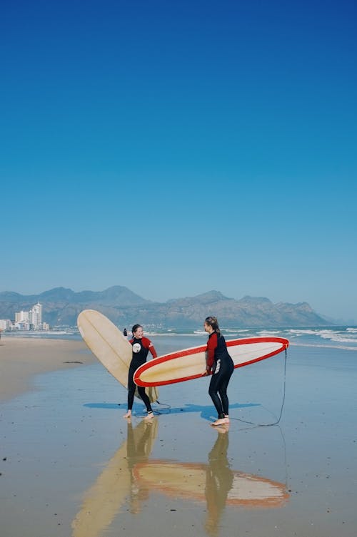 Surfers on a Beach