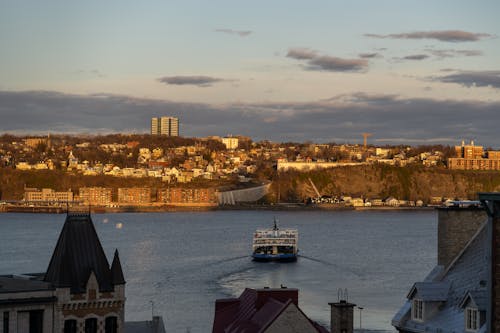 Photos gratuites de coucher de soleil doré, fleuve, québec