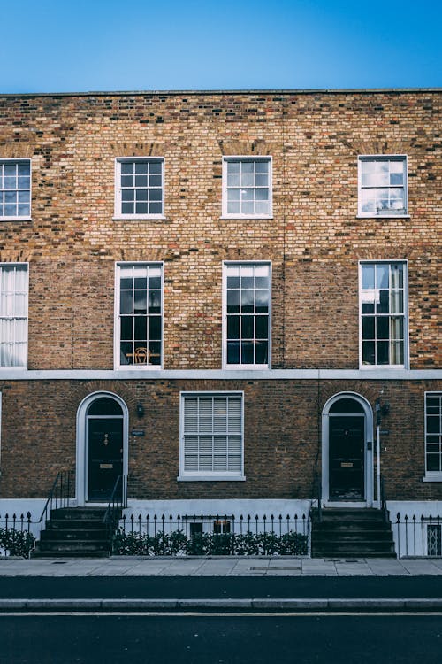 Brick Tenement by the Street 