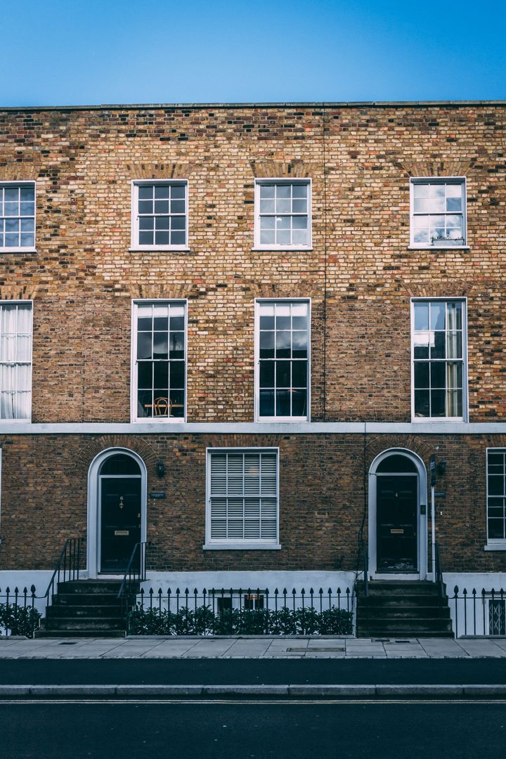 Brick townhouse with sash windows in London