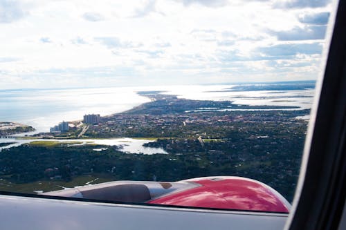 Portrait Plane Window Seat Picture in the Clouds Air Serbia Airplane New York City Flying Over the Atlantic Horizontal Desktop Format Wallpaper iPhone 4K Window Seat