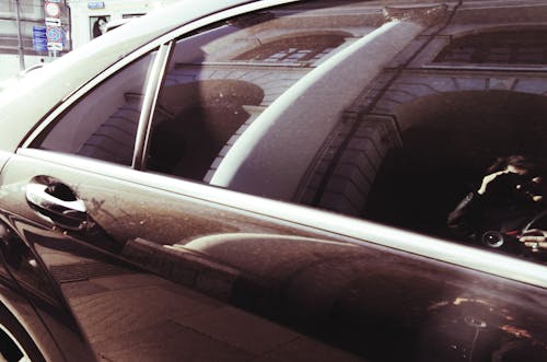 Tenement Reflection in Car Windows