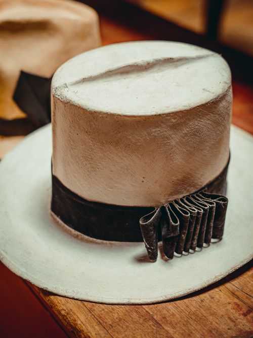 Free Close-up of a traditional handcrafted Peruvian hat on display in a Cusco shop. Rich cultural heritage. Stock Photo