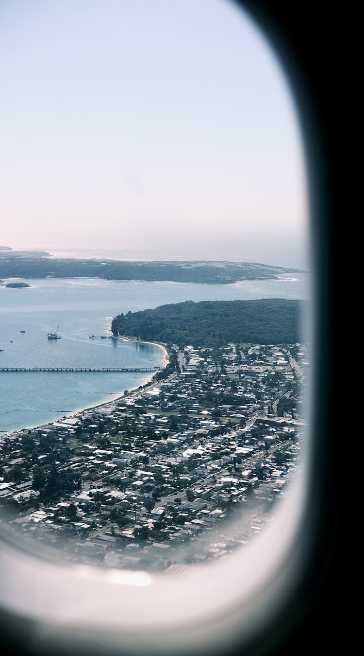 View Of A Coast From A Plane Window