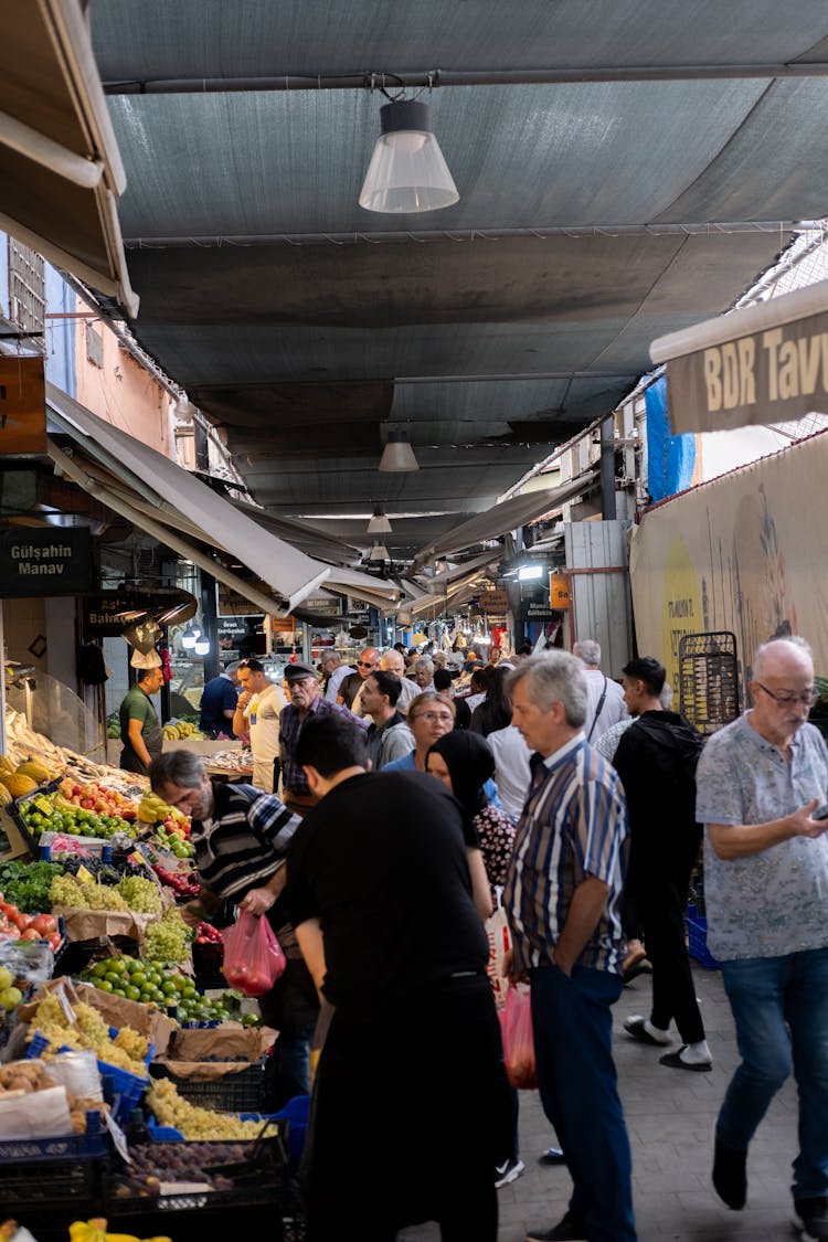 People Shopping At Bazaar