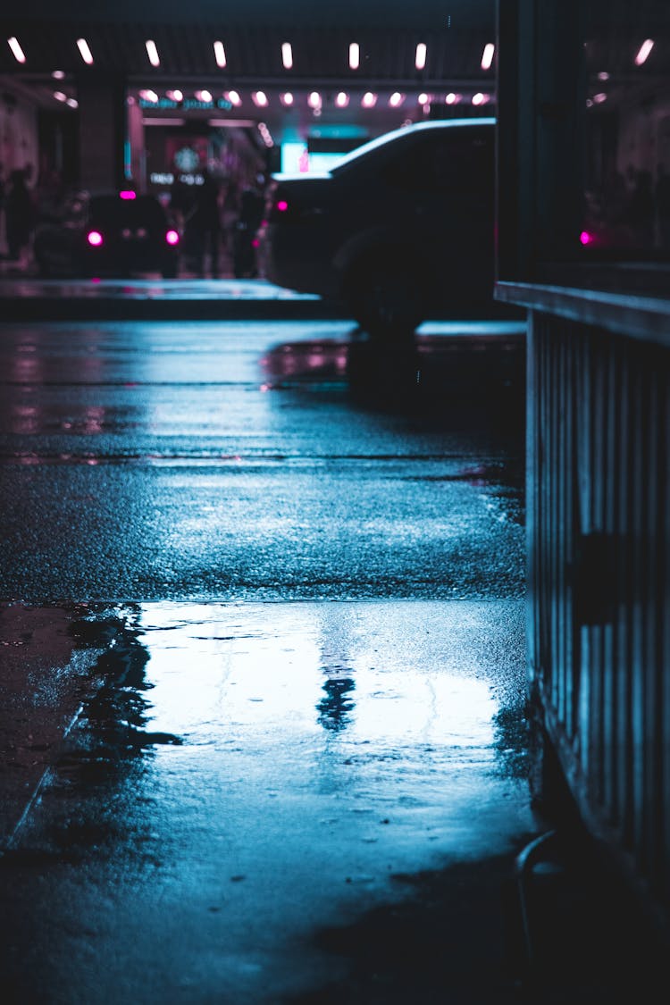 Car Parked On Wet Road