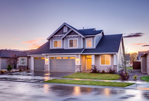 Free Blue and Gray Concrete House With Attic during Twilight Stock Photo