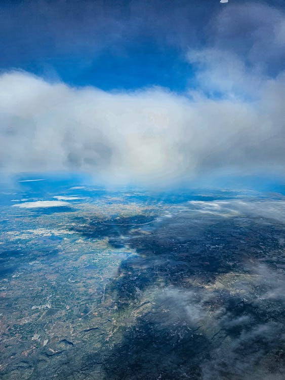 Clouds over Terrain Seen From Sky
