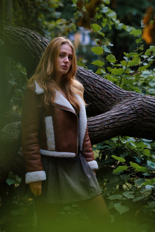 Confident Woman Standing in the Park