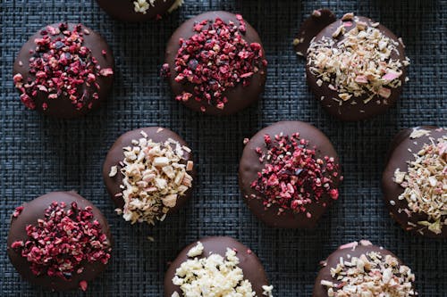 Chocolate covered strawberries with nuts and chocolate